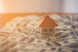 the cost of foundation repair - house with money